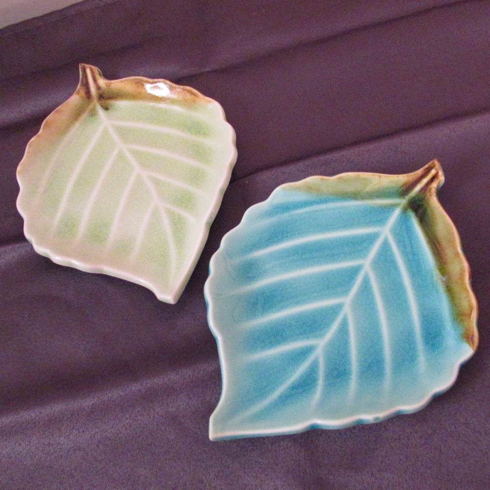 Vintage pair leaf shaped plates